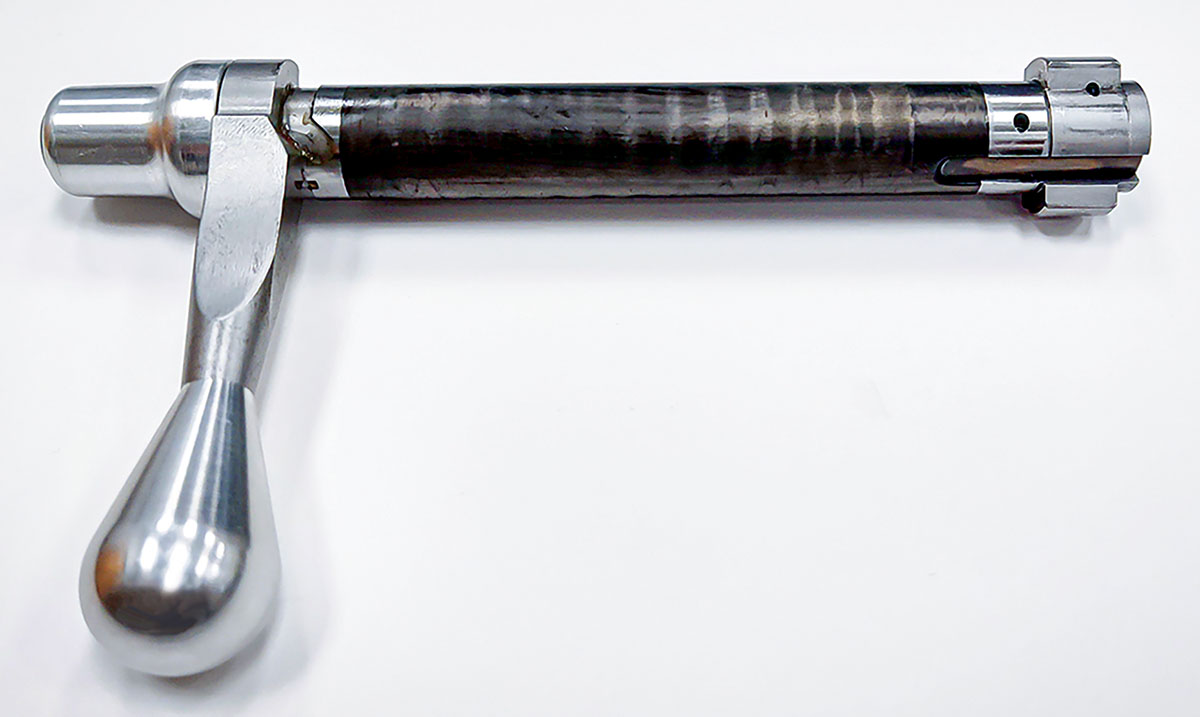 A close-up of the carbon-fiber-wrapped bolt. In addition to saving weight, it runs through the raceway silky smooth.